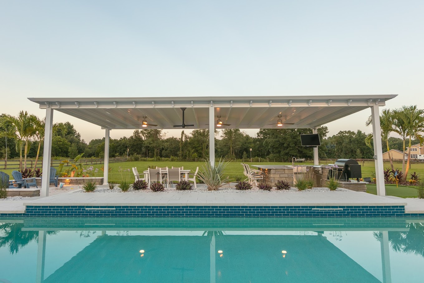 Custom Outdoor Kitchen with Traeger, Renaissance Pergola, Putting Green, and Beach Area – Lakeland, FL